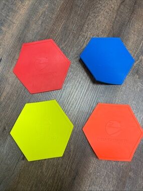 Beachbody Hexagon Sliding Discs in Red, Blue, Yellow, Orange